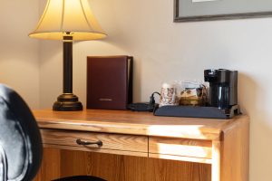 in-room work desk and coffee maker